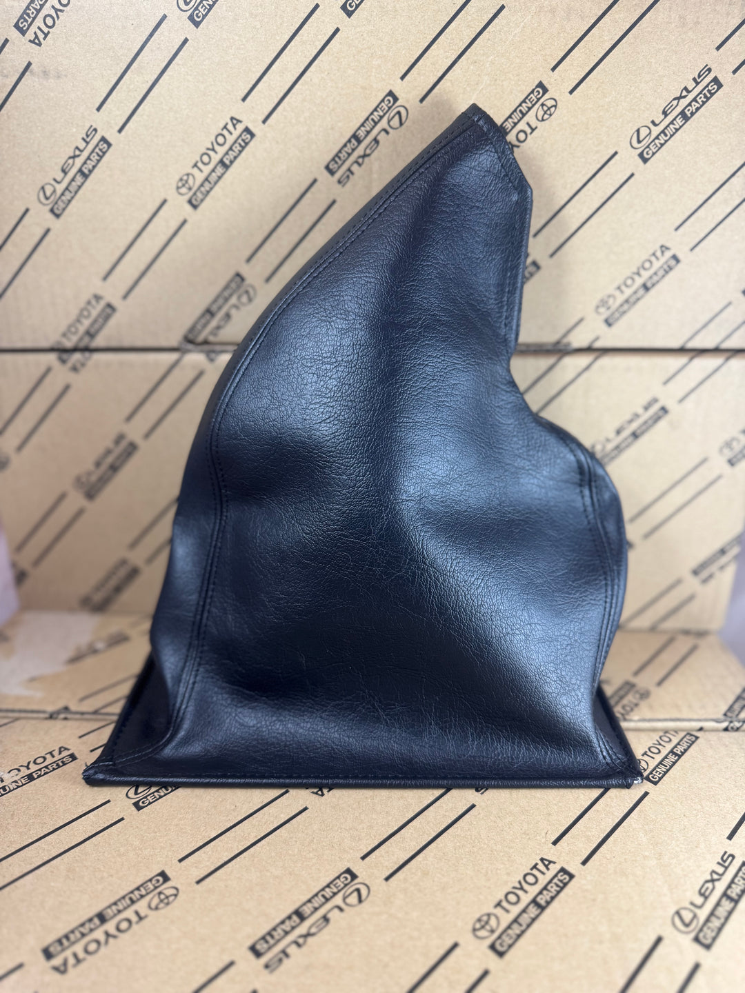 OEM Toyota e-brake handle cover/hood for the 93-98 80 series /LX450 Land Cruiser black landcruiser 46243-60040